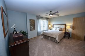 Franklin apartment for rent - a bedroom with a bed and a ceiling fan