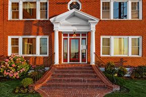 Seattle apartment for rent - a red brick house with a red front door