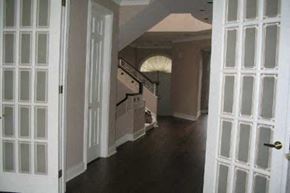 Toronto apartment for rent - A hallway with a dog on the floor.