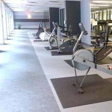 Toronto apartment for rent - A gym with a row of stationary bikes.