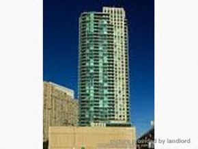 Toronto apartment for rent - A tall building with many windows is shown in the image.