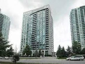 Toronto apartment for rent - A large glass building stands between two smaller ones.