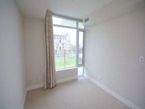 Toronto apartment for rent - A room with a window and a curtain.