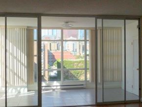Toronto apartment for rent - A room with sliding glass doors leading to a balcony.