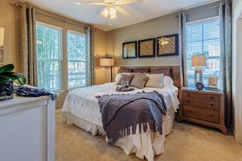 Nona park village apartments pool area ceiling fans in living rooms and bedrooms
