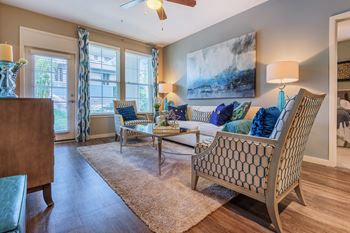 Nona park village apartments pool area wood-style flooring in foyers, kitchens, living rooms, and baths