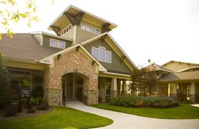 Marietta apartment for rent - a house with a walkway and lawn in front of it