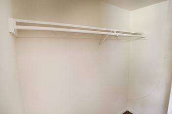 Generous walk-in closets with shelving