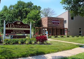 Florence townhouse for rent - a building with a sign for a restaurant on the sidewalk at Wentworth Estates Apartments, Florence, KY, 41042