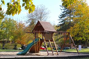 Florence townhouse for rent - a playground with a swing set and a slide  at Wentworth Estates Apartments, Kentucky