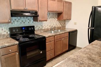 Fully furnished kitchen with stainless steel appliances