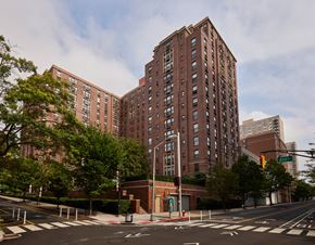 Hoboken apartment for rent - an empty street in front of a tall building