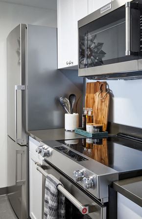 Hoboken apartment for rent - a small kitchen with a stove and a microwave