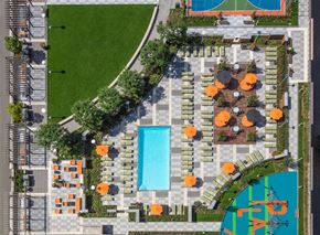 Jersey City apartment for rent - a birds eye view of a park with a swimming pool