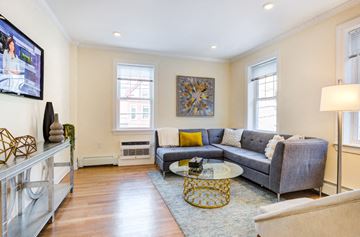 Brookline apartment for rent - a living room with a couch and a coffee table