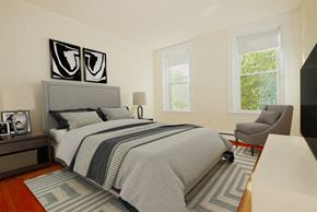 Brookline apartment for rent - a bedroom with a bed and two windows