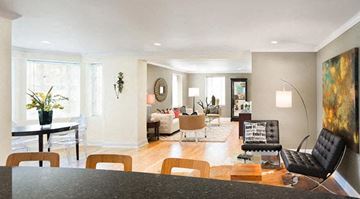 Brookline apartment for rent - a living room with a black table and chairs