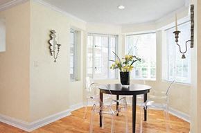 Brookline apartment for rent - a dining room with a table and chairs and windows