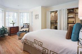 Brookline apartment for rent - a bedroom with a large bed and a closet