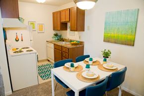 Batavia apartment for rent - a kitchen and dining area with a table and chairs