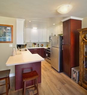 Los Angeles apartment for rent - a kitchen with a white counter top and a stainless steel refrigerator
