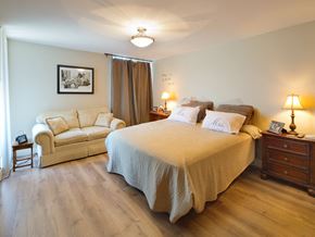 Los Angeles apartment for rent - a view of a bedroom with a bed and a couch