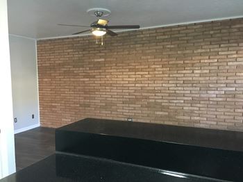 Exposed brick accent wall*