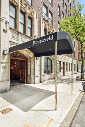 Manhattan apartment for rent - A building with a black awning that says Petersfield.