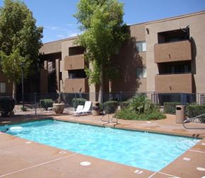 Glendale apartment for rent - a swimming pool in front of an apartment building