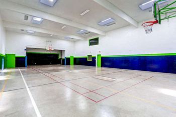 The community indoor basketball court at morningtree park apartments