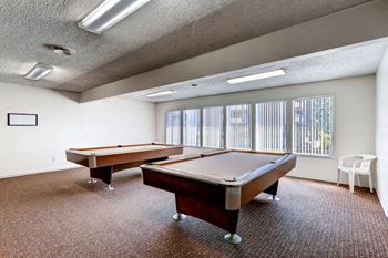 The community clubhouse with pool tables at morningtree park apartments