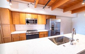 Seattle apartment for rent - a kitchen with a counter top and a sink