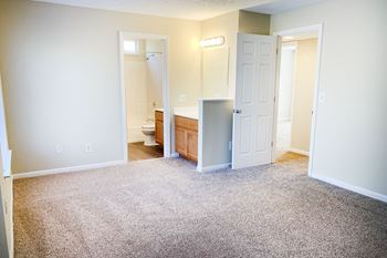 Beige carpet in bedroom