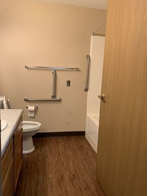 Grand Forks apartment for rent - a bathroom with a toilet and a shower and a sink