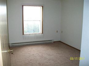Sturgis apartment for rent - an empty room with a window and a door