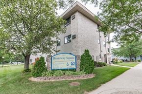 Monticello apartment for rent - a building with a blue and white sign in front of it