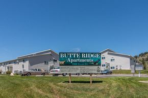 Sturgis apartment for rent - a sign apartments in front of a building