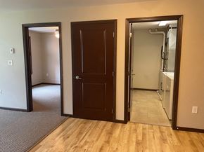 Duluth apartment for rent - a bedroom and a bathroom with a closet and a shower