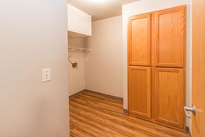 Bismarck apartment for rent - a bedroom with wooden floors and a closet