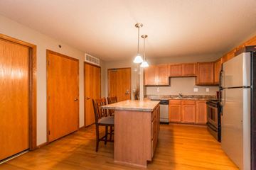 Elk River apartment for rent - a kitchen with wooden cabinets and a counter top