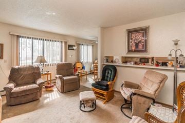 Waconia apartment for rent - the living room has a lot of chairs and a bar