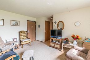 Waconia apartment for rent - a living room filled with furniture and a tv