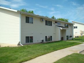 Hot Springs apartment for rent - a white house with a lawn and a sidewalk