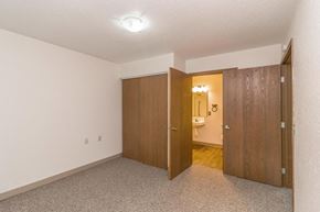 Princeton apartment for rent - a bedroom with a closet and a door to a bathroom