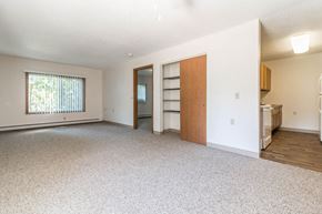 Princeton apartment for rent - an empty living room with a kitchen and a window