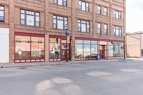Devils Lake apartment for rent - the front of a brick building on a city street