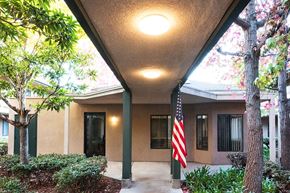 San Diego apartment for rent - a home with an flag outside of the front porch