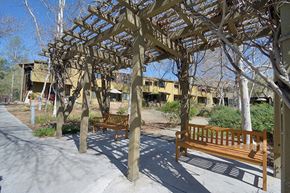 Poway apartment for rent - two benches under a wooden structure in a park