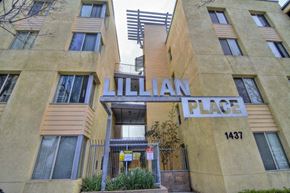 San Diego apartment for rent - a large building with a sign on the side of it