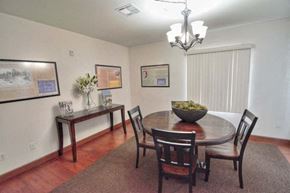 San Diego apartment for rent - a dining room with a table and chairs